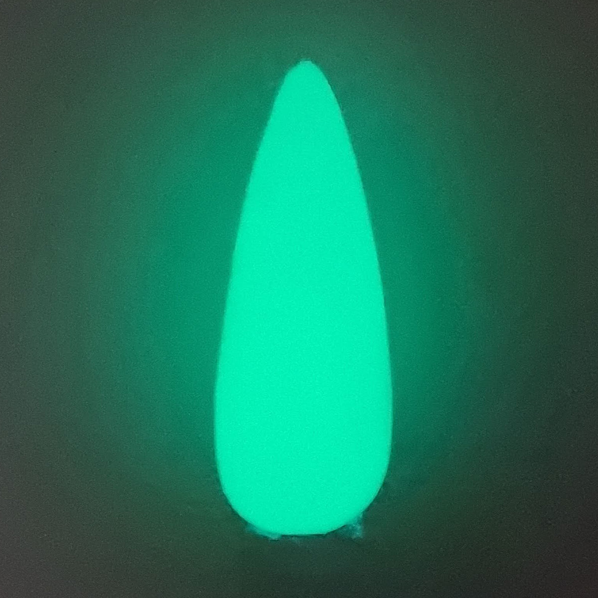 Swatch of Green Lantern Dip Powder in dark